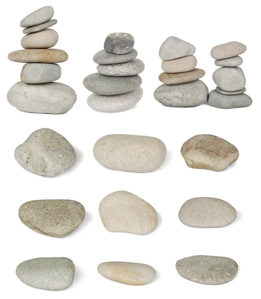 Set of pile stones from the river are isolated on white background