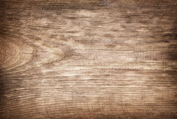 Tagliere in legno graffiato marrone. — Foto Stock