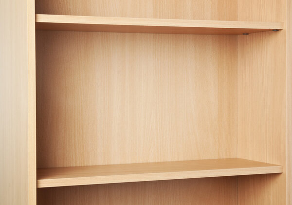 Empty brown bookcase for books and other items to keep, made of wooden planks