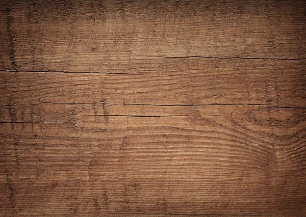 Donkerbruin gekrast houten snijplank. Houttextuur — Stockfoto