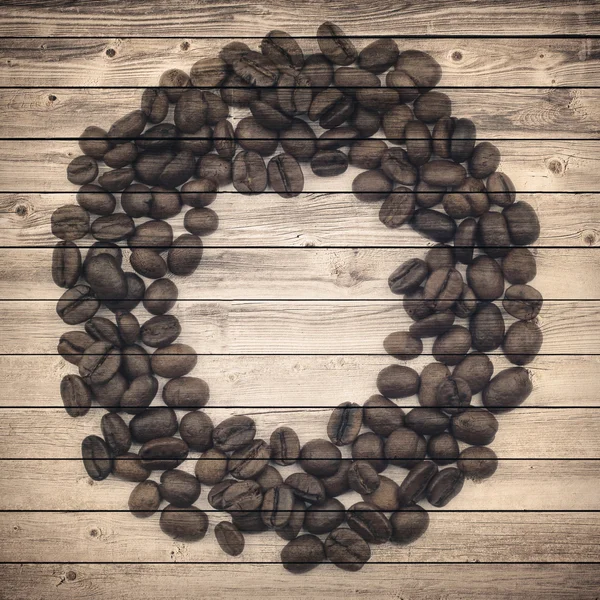 Old brown planks and coffee beans circle. Collage background — Stock Photo, Image