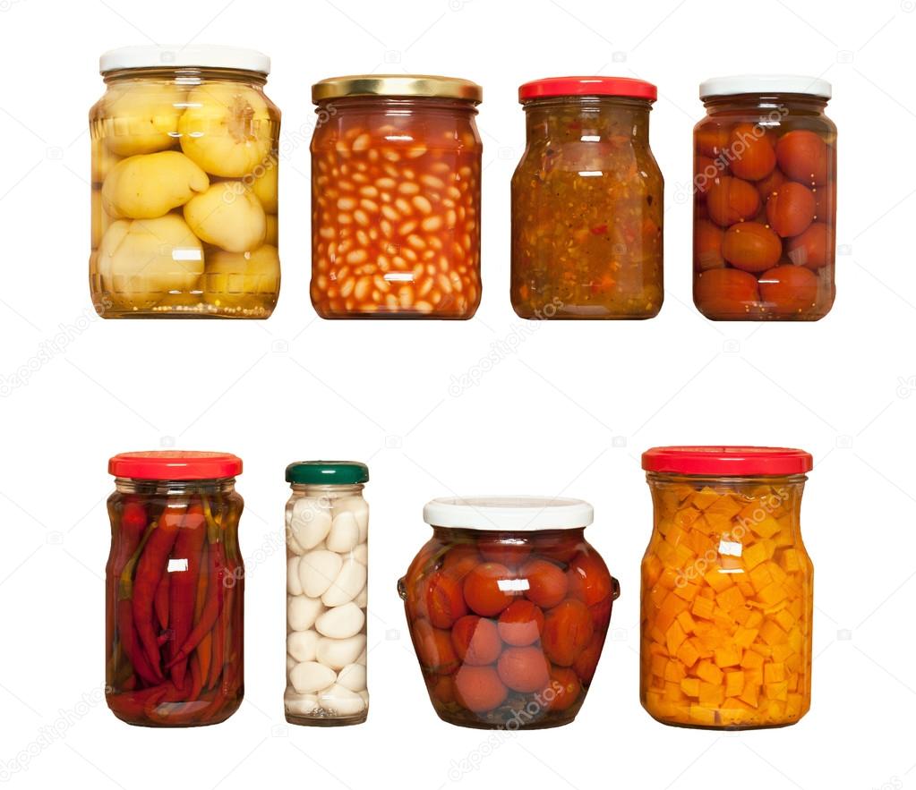 Preserved carrots, tomatoes, garlic, chilli, beans on white background