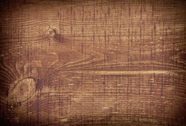 Koyu kahverengi çizik ahşap kesim tahtası. Ahşap doku