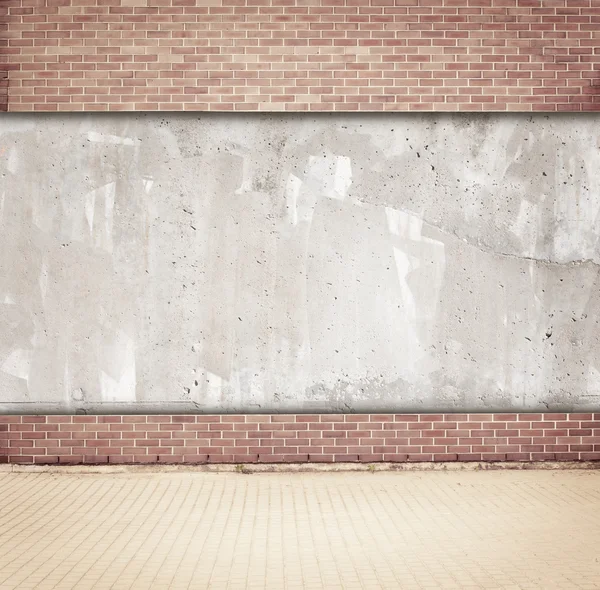 Brown brick and concrete wall background with walkway — Stock Photo, Image