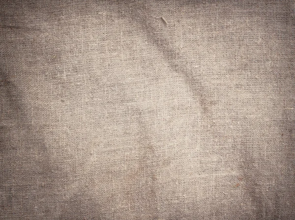 Old dirty brown horizontal creasy burlap texture — Stock Photo, Image