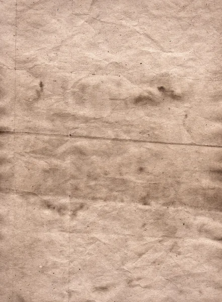 Легкий гранжево-коричневий перероблений пергамент з плямами, паперова текстура — стокове фото