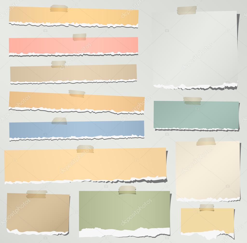 Set of various colorful torn note papers with adhesive tape on gray background