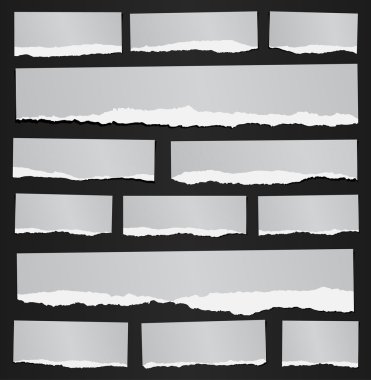 Siyah arka plan üzerine çeşitli gri geri dönüşümlü yırtık grenli Not belgeler kümesi