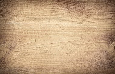 Açık kahverengi ahşap kesme tahtası çizilmiş. Ahşap doku