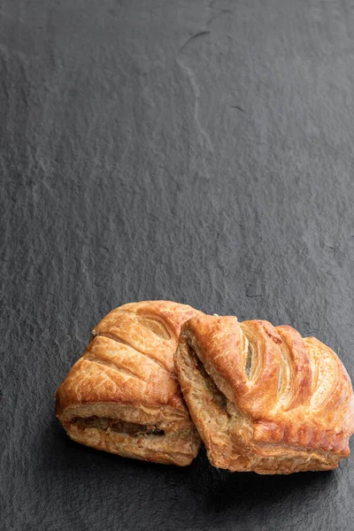 Sausage Meat Puff Pastry Black Stone Background — Stock Photo, Image