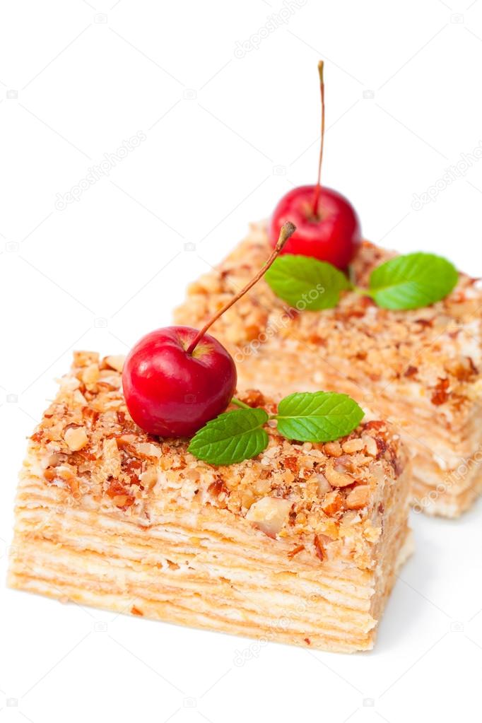 Napoleon  cake with wild apple and mint on white background 