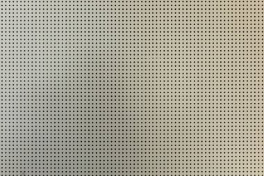 beyaz ışık delikli alçı tahta duvar