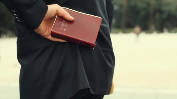 French Priest Holding Holly Bible Close Up — Stock Video