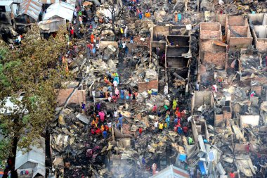 7 Haziran 2021 'de Bangladeş, Dhaka' da çıkan yıkıcı yangından sonra Mohakhali gecekondu mahallesinin en üst görüntüsü. Dhaka 'daki Mohakhali varoşlarında çıkan yıkıcı yangın nedeniyle en az 300 gecekondu yıkıldı..