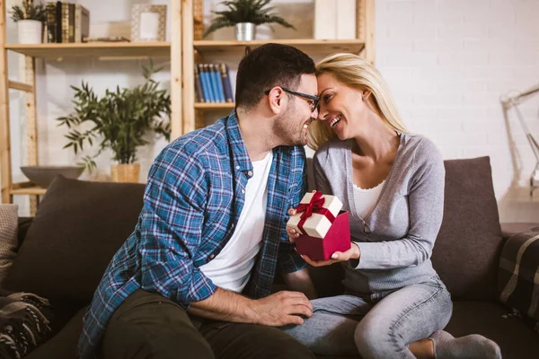 Young Woman Receiving Surprise Gift Box Her Boyfriend Home — Stock Photo, Image