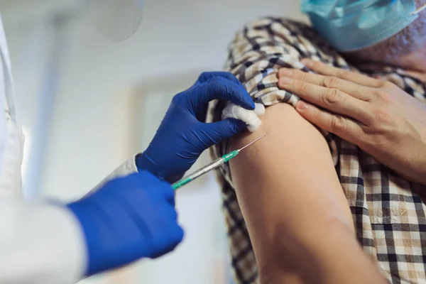 Man Receiving Vaccine Shot Hand While Wearing Face Protective Mask — Stock Photo, Image