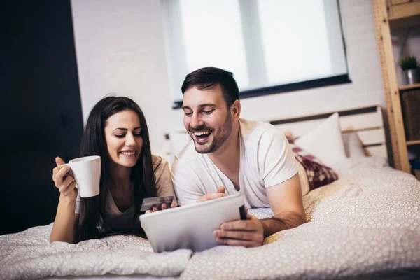 Young Couple Shopping Online Comfort Bedroom Using Digital Tablet Credit — Stock Photo, Image