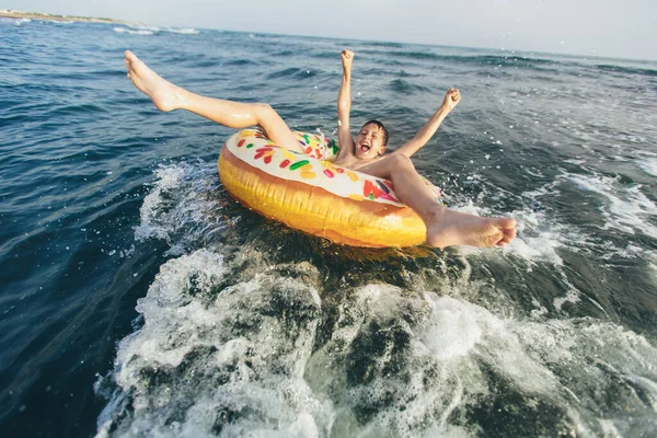 Joyful Child Inflatable Ring Ride Breaking Wave Travel Lifestyle Swimming — Stock Photo, Image