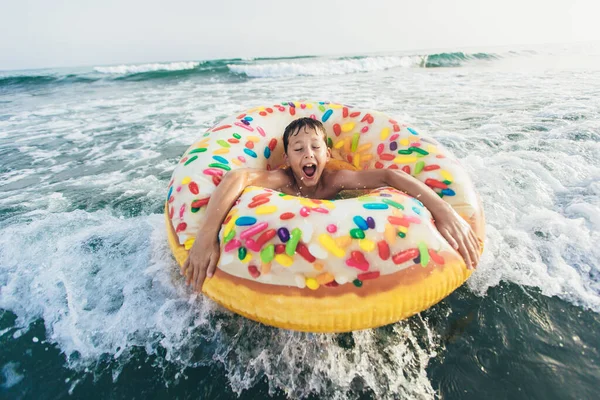 Joyful Child Inflatable Ring Ride Breaking Wave Travel Lifestyle Swimming — Stock Photo, Image