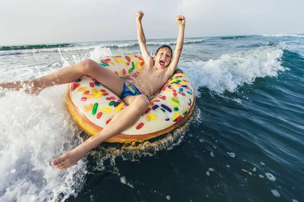 Joyful Child Inflatable Ring Ride Breaking Wave Travel Lifestyle Swimming — Stock Photo, Image