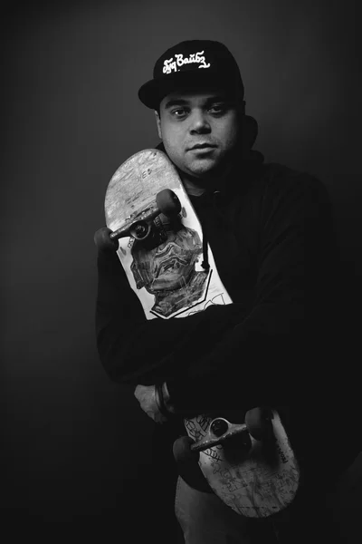 Young man with skateboard — Stock Photo, Image