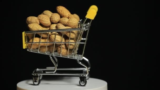 Footage Peanut Trolley Dark Background — Stok video