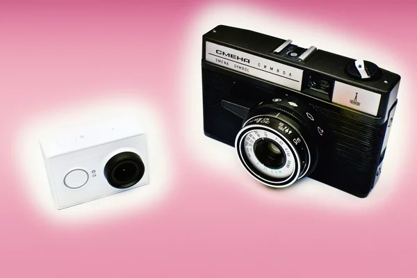 White action camera and old camera — Stock Photo, Image