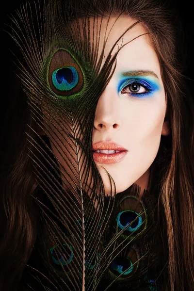 Beautiful Woman. Face with Makeup and Peacock Feather — Stock Photo, Image