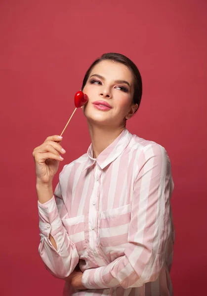 Portrait Cute Woman Holding Red Heart Red Background — Φωτογραφία Αρχείου