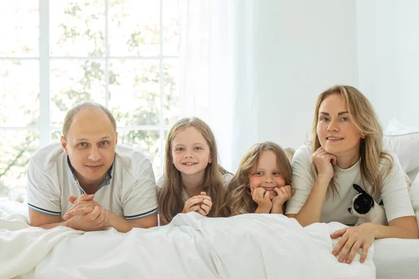 Happy Family Two Children Lying Looking Camera Lovely Family Portrait Stock Image