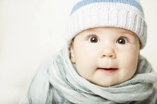 Small baby in blue cap — Stock Photo, Image