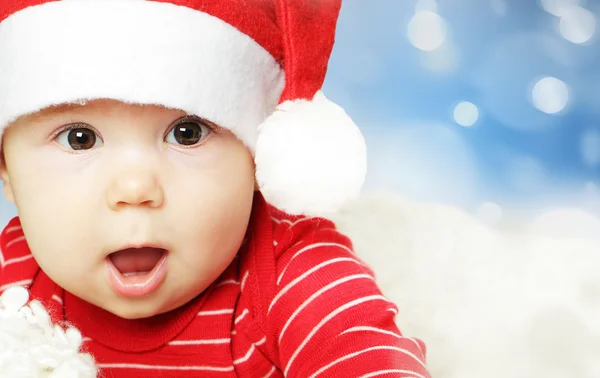 Surprised baby in Santa hat — Stock Photo, Image
