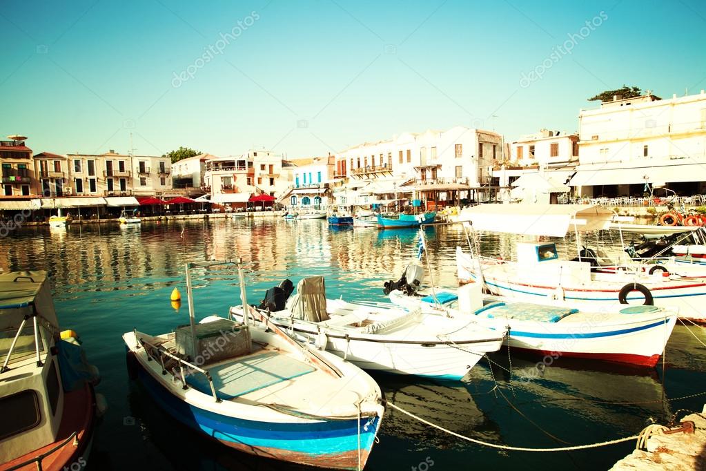 Rethymnon old city center with boats in sea bay, impressions of 