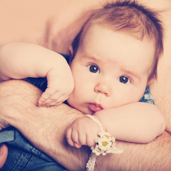 Little baby girl on father's hands — Stock Photo, Image