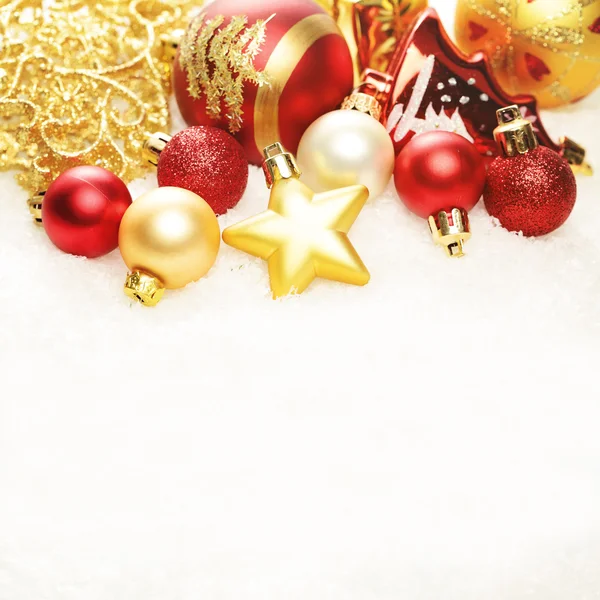 Christmas Background. Xmas Red and Gold Decorations Border on Sn — Stock Photo, Image