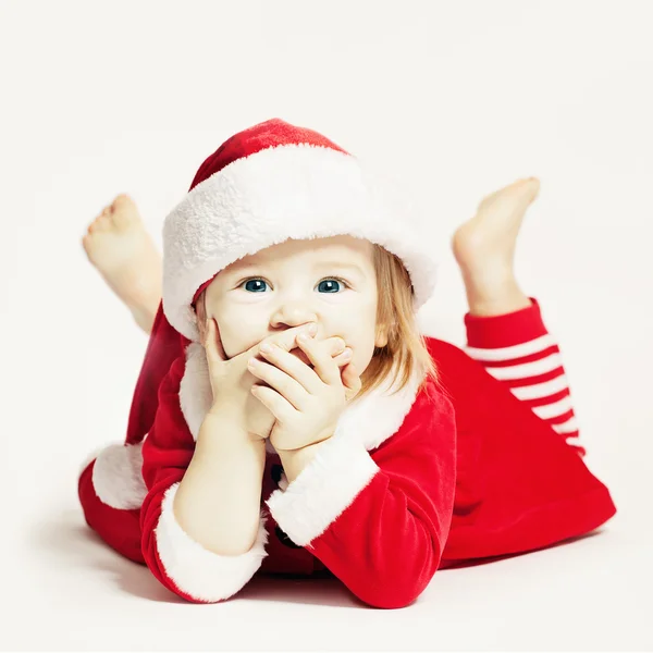 Gelukkig Baby in Kerstman hoed. Baby kind lachen — Stockfoto