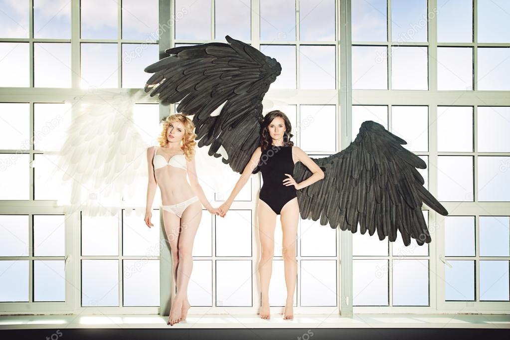 Sexy Women with Angel Wings. Black and White Angels