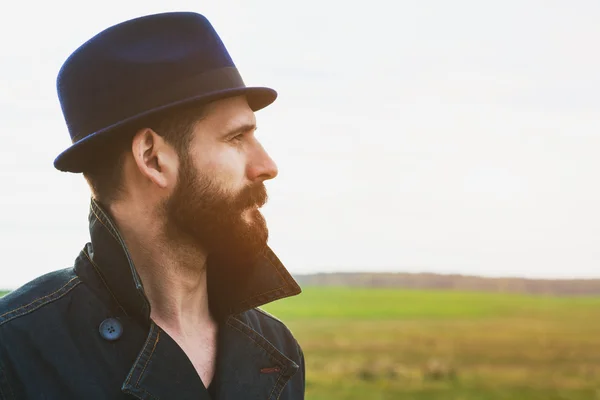 Portrait of handsome bearded man with hat. Space for text — Stock Photo, Image