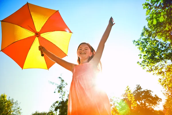 Happy redhead girl with umbrella — Stock Photo, Image