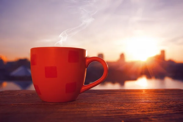 Morning coffee with city view in sunrise — Stock Photo, Image