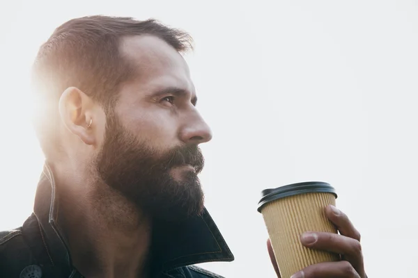 Bearded man with paper cup — Stock Photo, Image