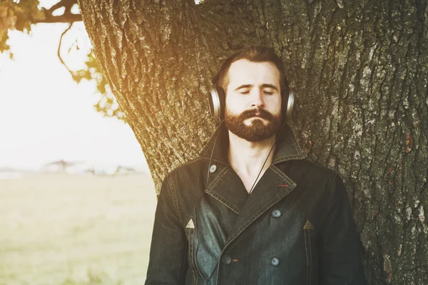 Bearded man  in headphones — Stock Photo, Image