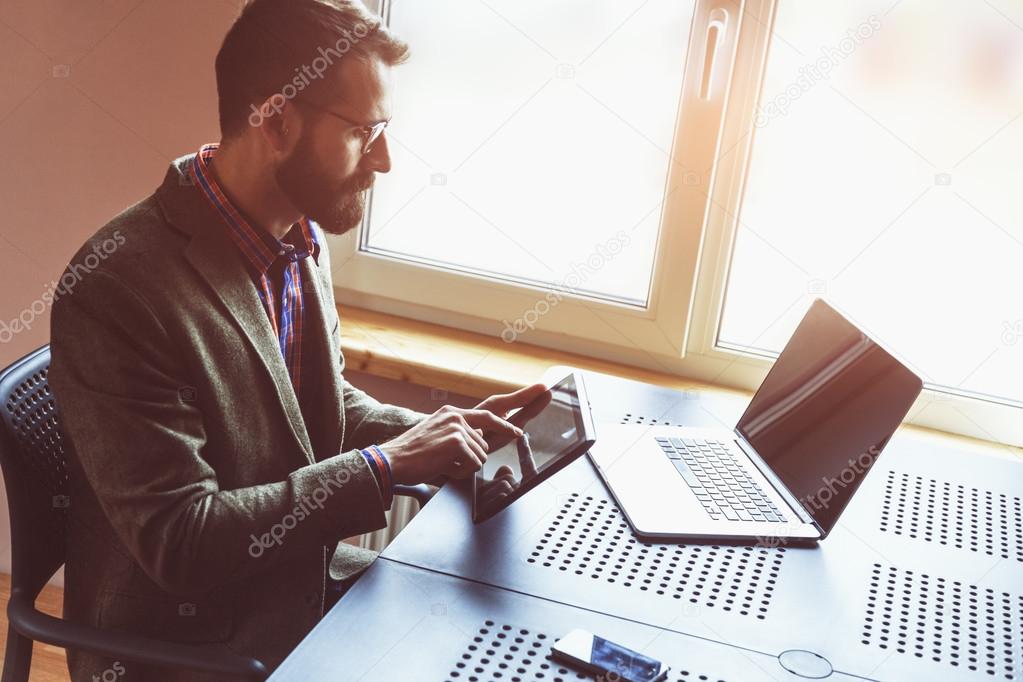 man working with laptop