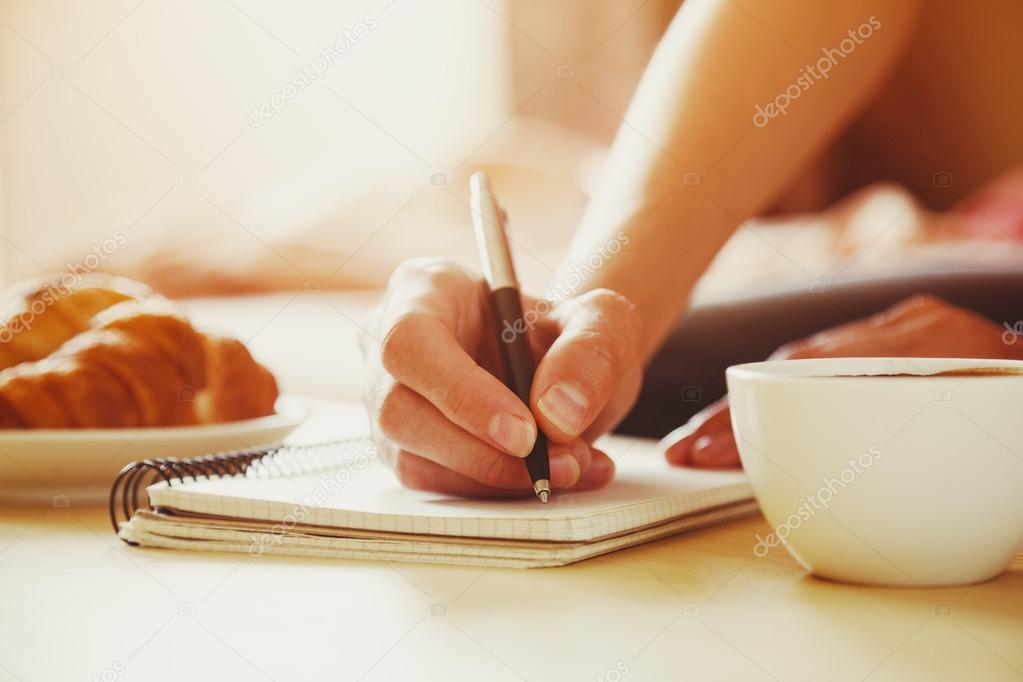 female hands with pen