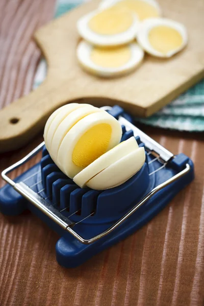 Boiled egg sliced on the board — Stock Photo, Image
