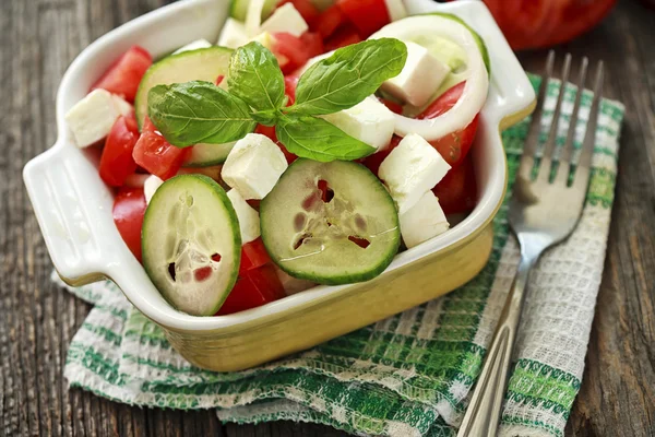 Salad with fresh vegetables and cheese — Stock Photo, Image