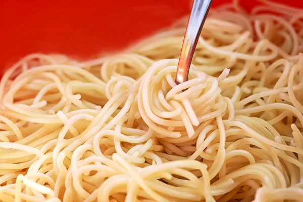 Close-up shot van gekookte spaghetti — Stockfoto
