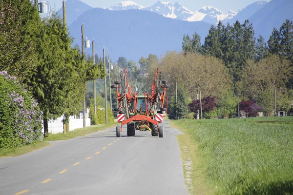 Grass Harvesting Equipment and Tractor — Stock Photo, Image