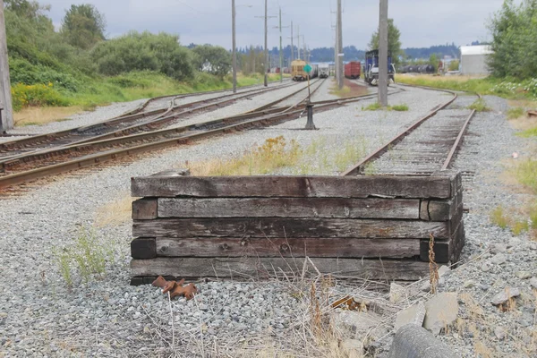 Jednoduchý dřevěný vlak bariéra — Stock fotografie
