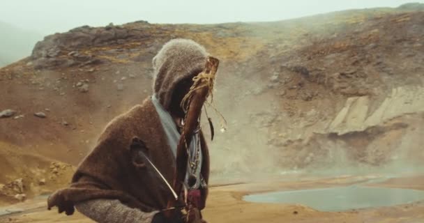 Mysterious Man In Hood Walking In Desert Landscape — Stock Video